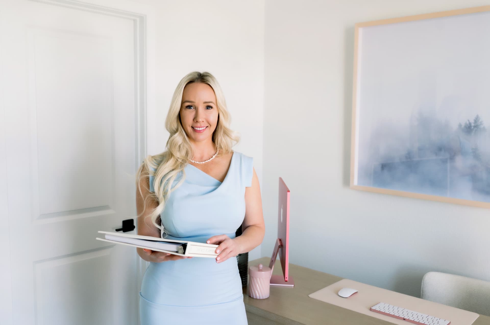 Amelia Dunaway standing in her office
